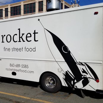 Rocket Fine Street Food - a food truck parked in a parking lot - New American Near Me Rocket Fine Street Food - a food truck parked in a parking lot - New American Near Me