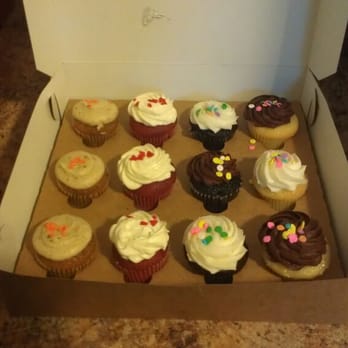 Molly's Cupcakes - A dozen mini Molly's cupcakes to go. Yum! :-P - Desserts Near Me - Chicago, Illinois Molly's Cupcakes - A dozen mini Molly's cupcakes to go. Yum! :-P - Desserts Near Me - Chicago, Illinois