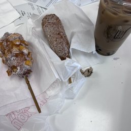 Two corndogs and a brown sugar milk tea