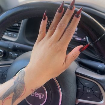 Chloe Nail and Spa - Black Stiletto with red airbrush in the middle - Nail Salons Near Me - Clovis, California Chloe Nail and Spa - Black Stiletto with red airbrush in the middle - Nail Salons Near Me - Clovis, California