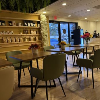 Spinning Coffee - View from the swinging chairs towards the front of house - Breakfast & Brunch Near Me - Bradenton, Florida