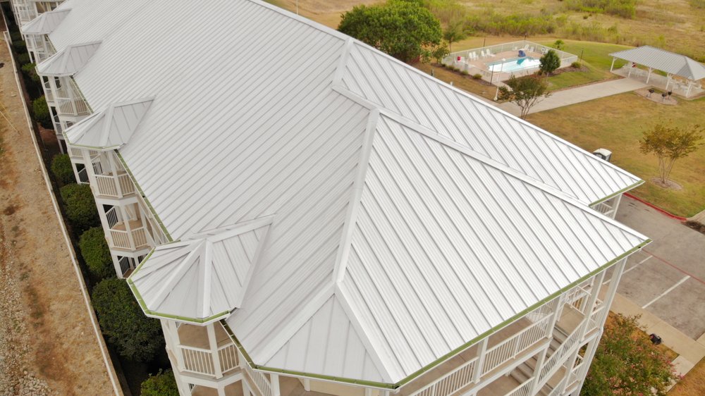 Slide of Top Notch Roofing