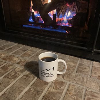 Premier Mountain Insurance - Cozy night with a warm glass of insurance. - Home & Rental Insurance Near Me - Littleton, Colorado Premier Mountain Insurance - Cozy night with a warm glass of insurance. - Home & Rental Insurance Near Me - Littleton, Colorado
