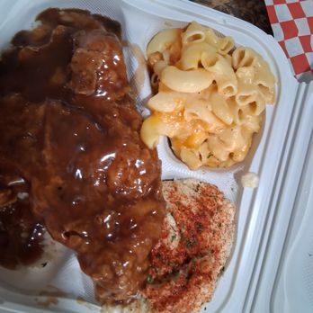 Rhapsody's Restaurant - Smothered pork chops on white rice, potatoe salad, and mac n cheese - Southern Near Me - Fresno, California Rhapsody's Restaurant - Smothered pork chops on white rice, potatoe salad, and mac n cheese - Southern Near Me - Fresno, California