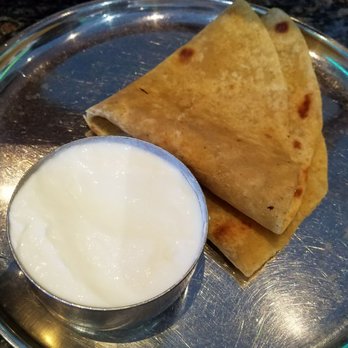 Bhimas Vegetarian - Side of Chapathi, Yoghurt, and I swear there was a papad on a separate plate with the Andhra Spicy King Thali. - Indian Near Me - Artesia, California Bhimas Vegetarian - Side of Chapathi, Yoghurt, and I swear there was a papad on a separate plate with the Andhra Spicy King Thali. - Indian Near Me - Artesia, California