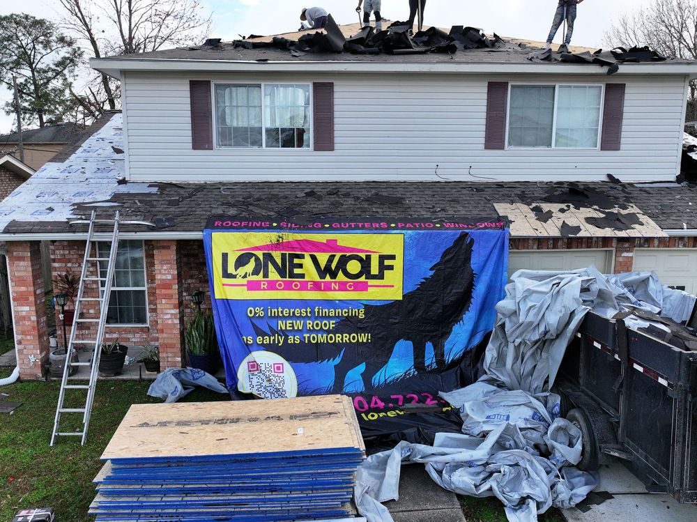 Slide of Lone Wolf Roofing