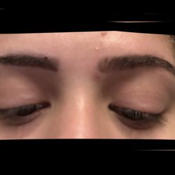 Two different shaped eyebrows I have been trying to scrub off the henna since I got home.