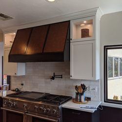 Dalecke Carpentry - Custom metal laminate inlay hood.