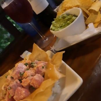 Lulu's Waikiki - Ahi Poke Bowl. Cheap Bottle of wine. Guacamole & Chips - Burgers Near Me - Honolulu, Hawaii Lulu's Waikiki - Ahi Poke Bowl. Cheap Bottle of wine. Guacamole & Chips - Burgers Near Me - Honolulu, Hawaii