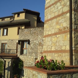 CDH Hotel Radda - Morning sun on hotel facade.
