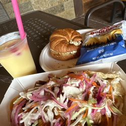The Ironbridge Grill - Burnt in nachos with jalapeño coleslaw Chicken salad sandwich , virgin piña colada