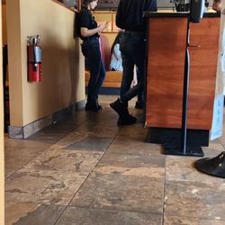 Keke's Breakfast Cafe - Employee working hard texting on her personal phone on company time.