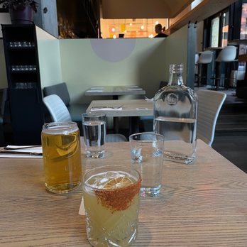 Mila - Seated near the windows in the lower-level. - Vegan Near Me - Vancouver, British Columbia