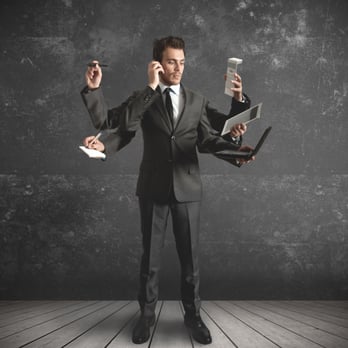 Errands 24/7 - a man in a suit holding a laptop, a cell phone, a cup of coffee, and a - Couriers & Delivery Services Near Me - Aliso Viejo, California