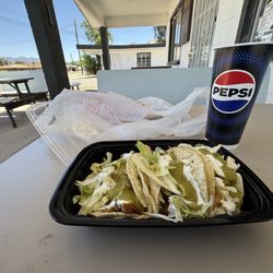 The Barnyard Mexican Grill - Patio with chicken tacos