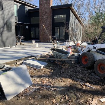 Juan Vargas Landscaping - a construction site with a skid steer - Tree Services Near Me - East Hampton, New York Juan Vargas Landscaping - a construction site with a skid steer - Tree Services Near Me - East Hampton, New York