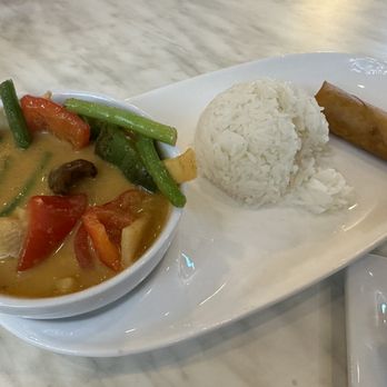 The Nine Heathrow Thai Grill & Kitchen - Red curry chicken with rice and spring roll - Thai Near Me - Heathrow, Florida The Nine Heathrow Thai Grill & Kitchen - Red curry chicken with rice and spring roll - Thai Near Me - Heathrow, Florida