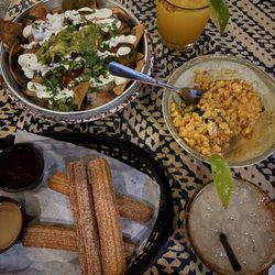 Rosy's Taco Bar - Nachos, Esquites, house margarita, virgina mango margarita, and Churros