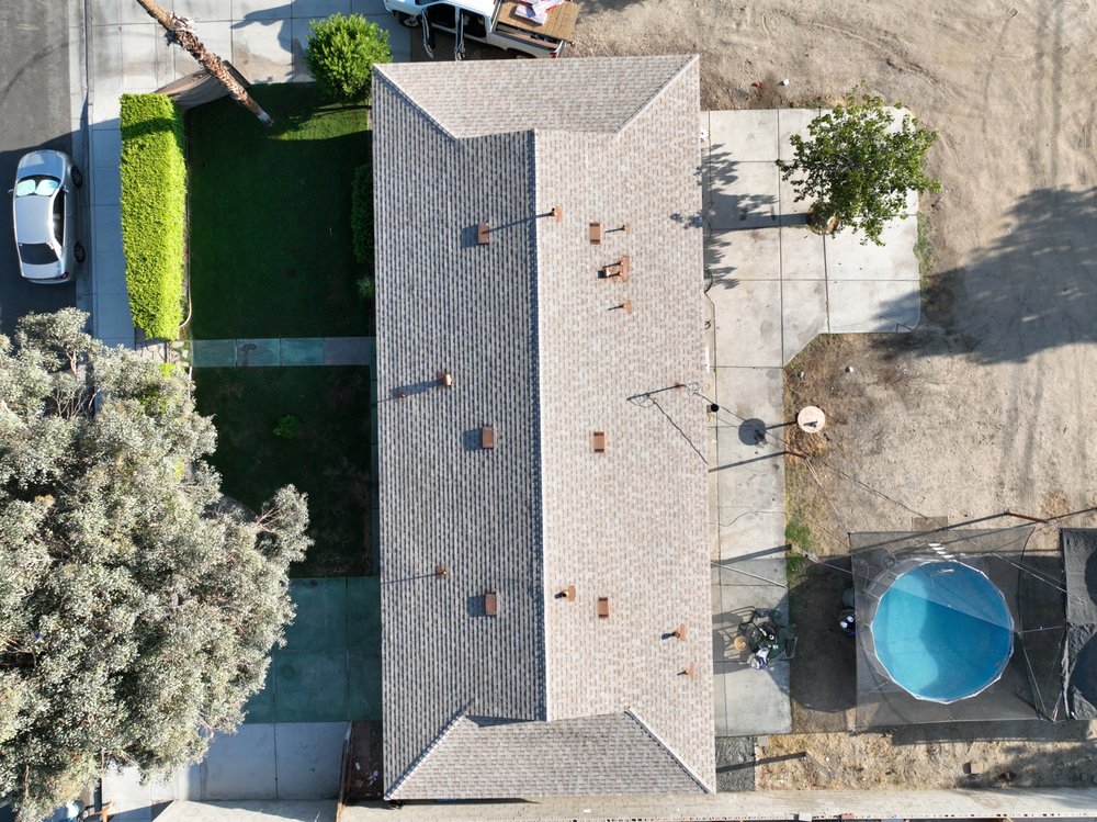 Slide of First Division Roofing