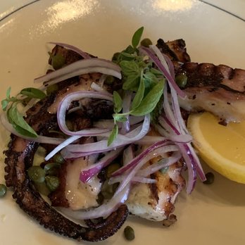 The Peacock - Wood Fire Grilled Octopus, Texas Olive Oil, Lemon, Laurel Leaf - Mediterranean Near Me - Austin, Texas The Peacock - Wood Fire Grilled Octopus, Texas Olive Oil, Lemon, Laurel Leaf - Mediterranean Near Me - Austin, Texas