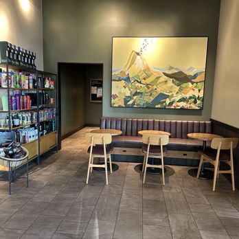 Starbucks - Seating area 2 along with merch wall - Coffee & Tea Near Me - Buffalo, New York Starbucks - Seating area 2 along with merch wall - Coffee & Tea Near Me - Buffalo, New York