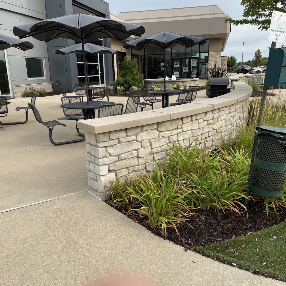 The patio is pet friendly & great place to wait on your car.
