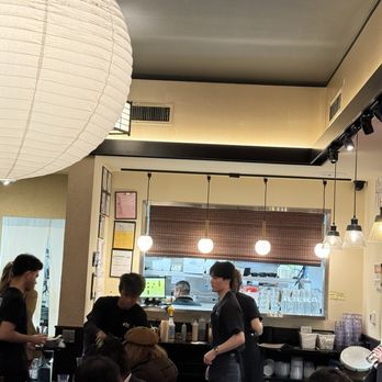 HINODEYA Ramen Union Square - Window-like opening between the kitchen and the dining room. - Ramen Near Me - San Francisco, California