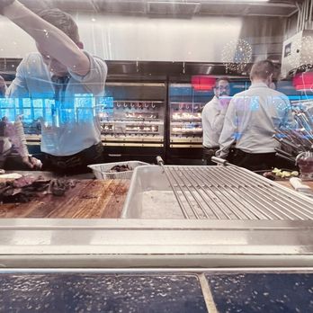Fogo de Chão - Guys working inside cutting the meats - Brazilian Near Me - The Woodlands, Texas
