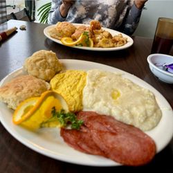 Jefferson Cafe & Food Market - Breakfast platter with Taylor ham, grits, scrambled eggs and biscuits.