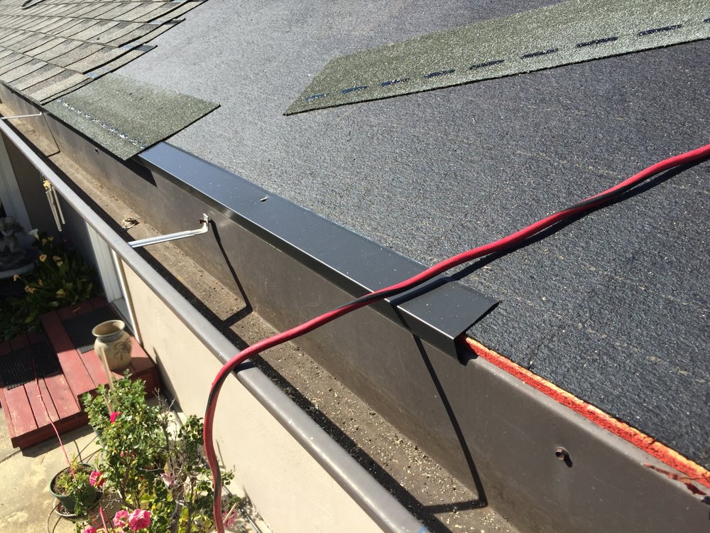 Slide of Economy Roofing