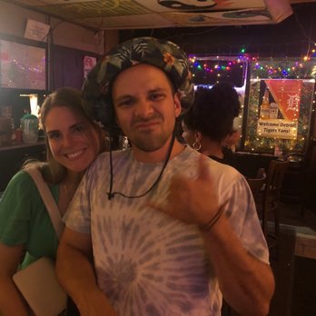 Marshall's Bar - a man and a woman posing for a picture - Bars Near Me - Detroit, Michigan