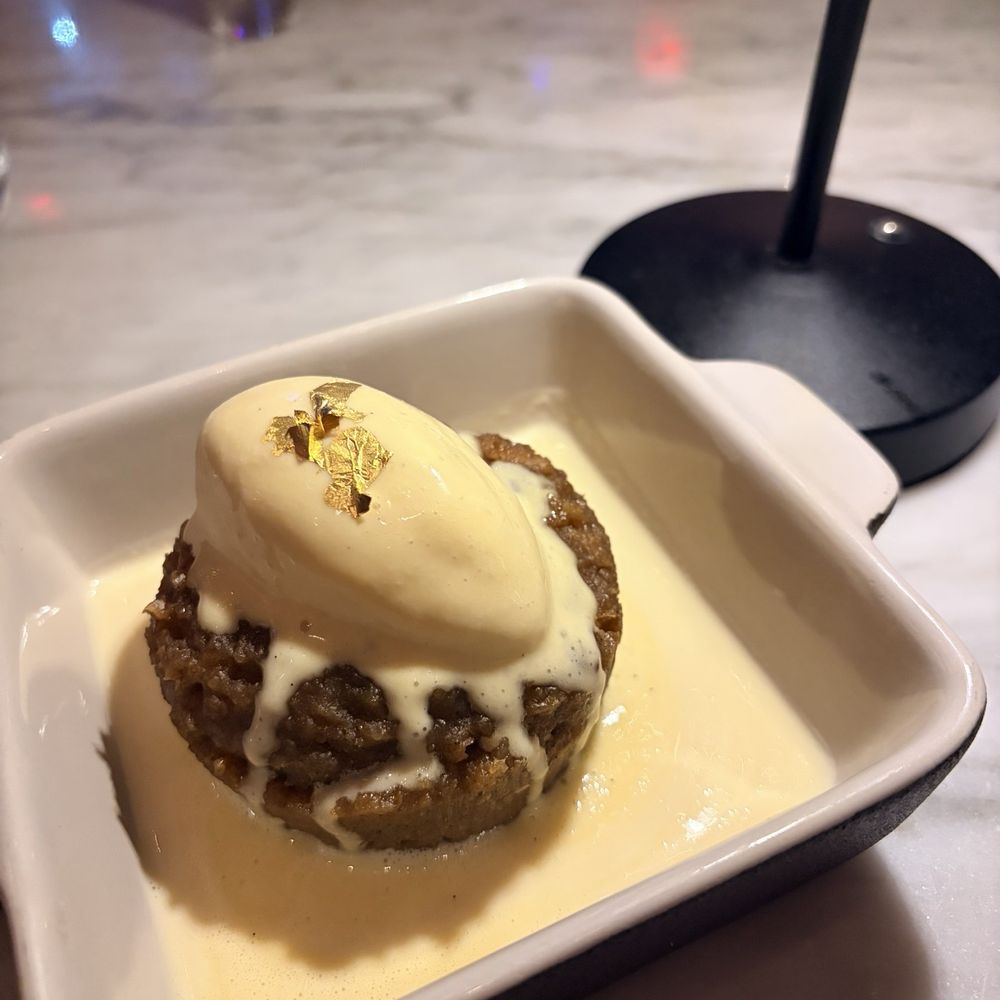La Central by Mario Pagán - A rum citrus kind of bread pudding dessert with crème anglaise (they called it something else but I don't remember) - New American Near Me - San Juan, Puerto Rico La Central by Mario Pagán - A rum citrus kind of bread pudding dessert with crème anglaise (they called it something else but I don't remember) - New American Near Me - San Juan, Puerto Rico
