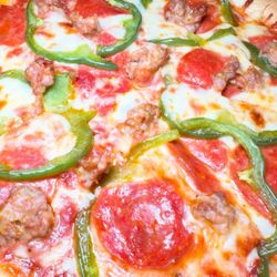 Pepe's Restaurant & Lounge - Pepperoni, sausage & peppers pizza.