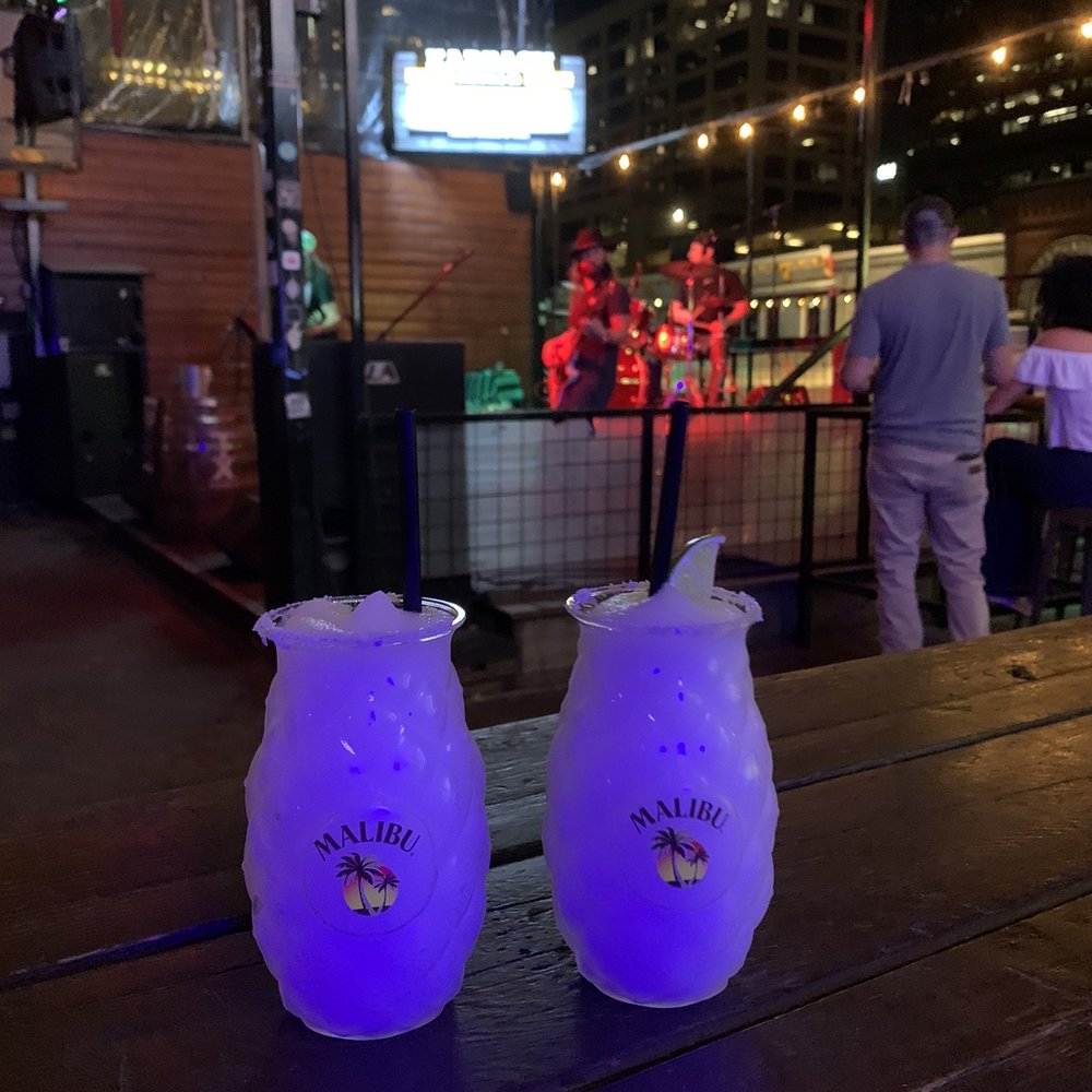 Blind Pig Pub - Malibu Margarita with live music in the background - Dive Bars Near Me - Austin, Texas Blind Pig Pub - Malibu Margarita with live music in the background - Dive Bars Near Me - Austin, Texas