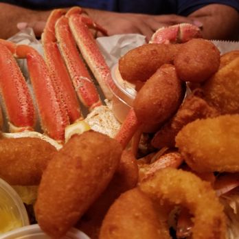 Fatty's Taphouse - The crab leg and shrimp platter with onion rings and hushpuppies. - Bars Near Me - Fredericksburg, Virginia Fatty's Taphouse - The crab leg and shrimp platter with onion rings and hushpuppies. - Bars Near Me - Fredericksburg, Virginia