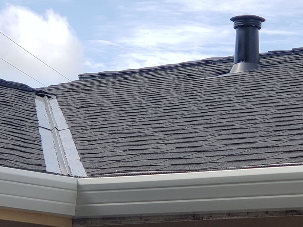 Slide of Freeman Roofing