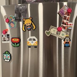 Sherwood Forest Feeders - Custom magnets made be an independent artist I bought from the store.