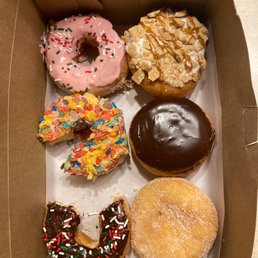 a variety of donuts in a box a variety of donuts in a box