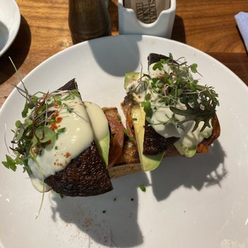 Sibling by Pushkin's - Portabella mushroom, avocado and sweet potatoes with Hollandaise sauce and micro greens. On non gluten toast with spinach. - New American Near Me - Sacramento, California Sibling by Pushkin's - Portabella mushroom, avocado and sweet potatoes with Hollandaise sauce and micro greens. On non gluten toast with spinach. - New American Near Me - Sacramento, California