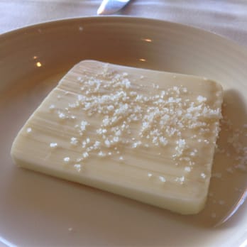 Nell's Restaurant - Sea salt and Kerrygold butter with bread - New American Near Me - Seattle, Washington