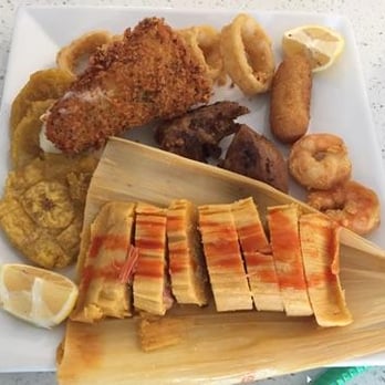 Dona Neli - a plate of food on a table - Mediterranean Near Me - Miami, Florida