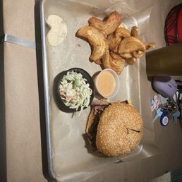 Brisket Sandwich, special sauce, slaw, and fries.
