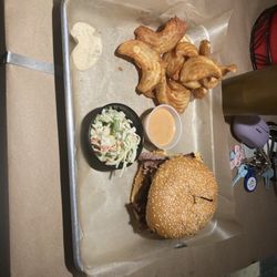 Pitmasters  Barbeque - Brisket Sandwich, special sauce, slaw, and fries.