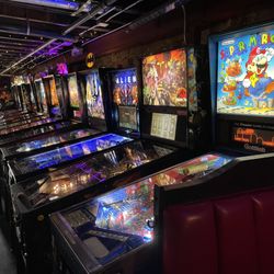Pinpoint Fayetteville - Pinpoint is a basement bar with a good number of pinball machines. This photo shows the majority of them, but there are several more.