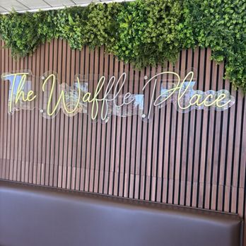 The Waffle Place - Waiting area with the waffle place sign - Breakfast & Brunch Near Me - Fresno, California The Waffle Place - Waiting area with the waffle place sign - Breakfast & Brunch Near Me - Fresno, California