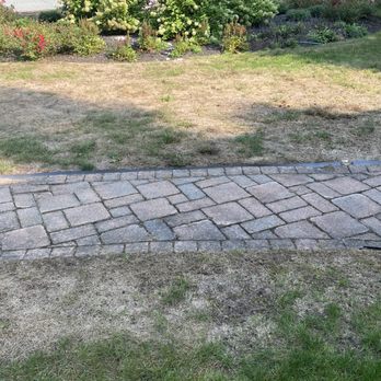 4everGreen Turf Management - a patch of grass in the middle of a driveway - Pest Control Near Me - West Warwick, Rhode Island 4everGreen Turf Management - a patch of grass in the middle of a driveway - Pest Control Near Me - West Warwick, Rhode Island