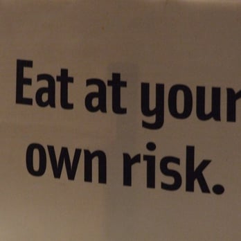 NuclearTacos - a sign saying eat at your own risk - Tacos Near Me NuclearTacos - a sign saying eat at your own risk - Tacos Near Me