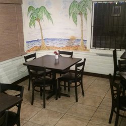 Dylans Pizza Bistro - The seating has been updated from the white astuc chairs to really comfortable blacketsl chairs with cushions.