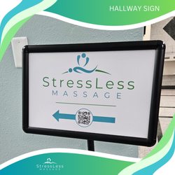 Stress Less Massage - Our hallway sign guiding the way to your therapy.