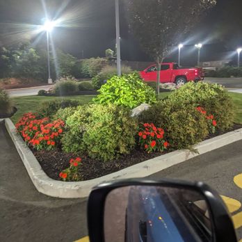 McDonald's - a red truck in a parking lot at night - Fast Food Near Me - Waterbury, Connecticut